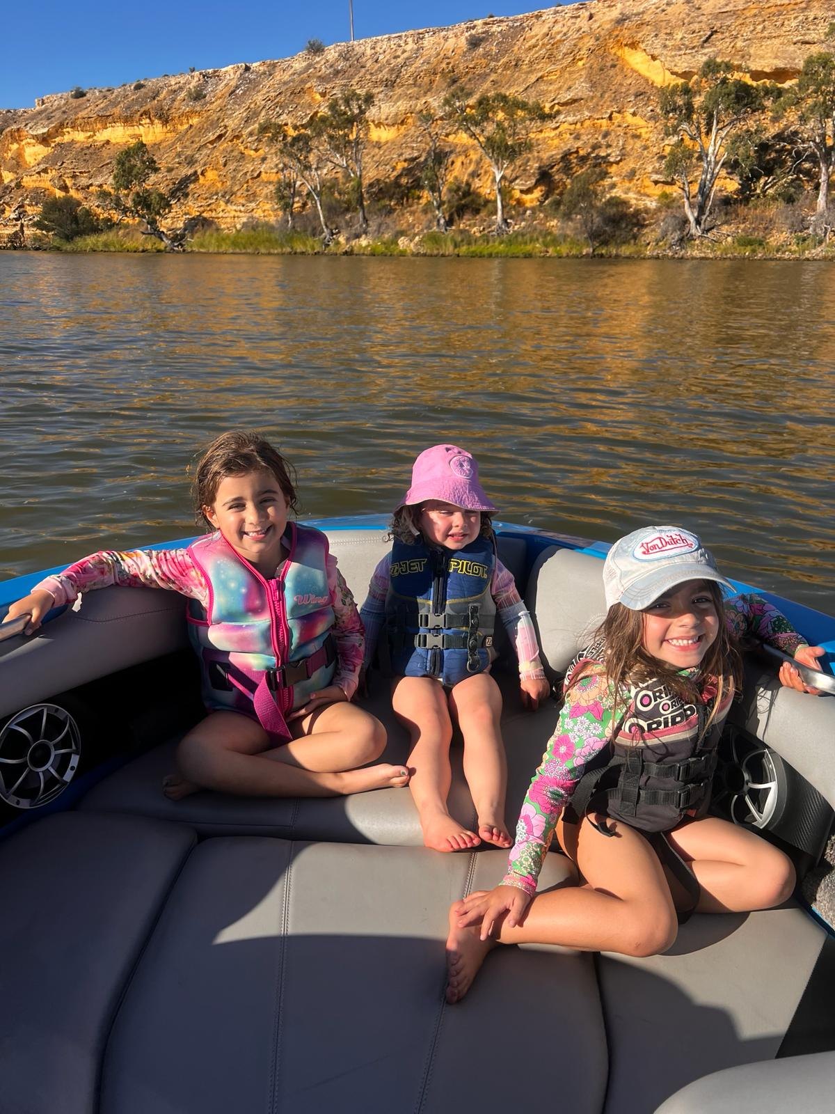 Family enjoying time together on the river